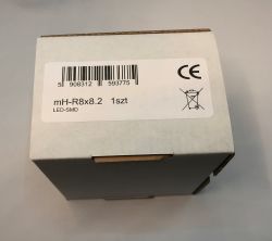 White cardboard box with a technical label, barcode, CE mark, and product code mH-R8x8.2.