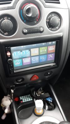 View of a car interior with a 7010b radio on the console.
