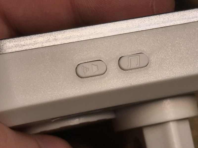 Wireless Doorbell Receiver Buttons Close-up of buttons on wireless doorbell receiver housing