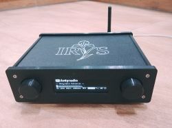 Black IRYS audio player with two knobs and an LCD showing Antyradio Katowice info