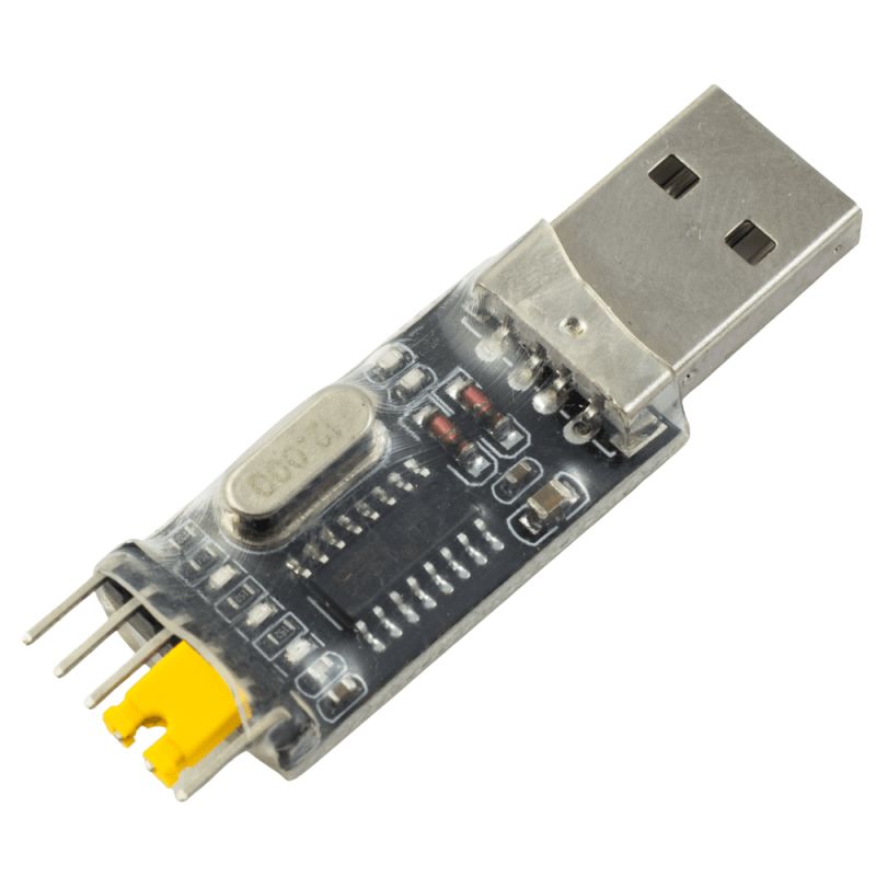 USB to UART CH340 Converter USB to UART converter with CH340 chip in a transparent plastic casing.