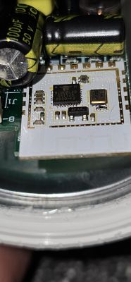 Close-up of the inside of an RGBWC bulb showing the BL602L20 chip.