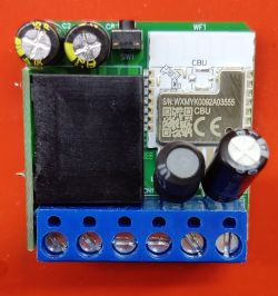 Wi-Fi module with relay and screw terminals on a red background