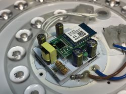 WB3S WiFi module and capacitors inside a ceiling lamp.