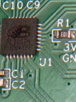 Close-up of BL2023N Chip on PCB Close-up of BL2023N integrated circuit on a circuit board.