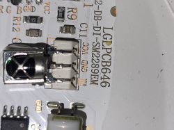 Close-up of PCB fragment with LG PCB646 marking and electronic components