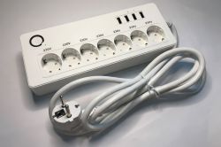 White power strip with six 230V sockets and four USB charging ports
