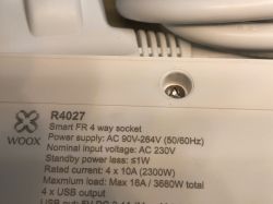 Woox R4027 Nameplate Nameplate of the Woox R4027 power strip with technical specifications.