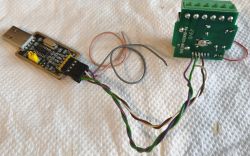 USB plug circuit board wired to a green module with a screw terminal block