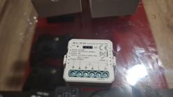 BLOW WiFi roller shutter controller on a glass surface