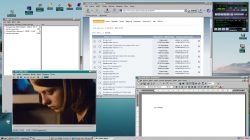 Pulpit systemu Windows 95 z otwartymi programami VLC, Word, Winamp i przeglądarką SeaMonkey