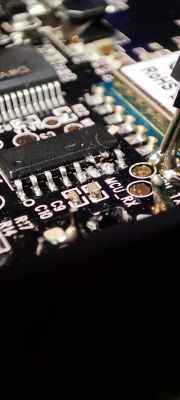 Close-up of Circuit Board with Integrated Circuits Close-up of a circuit board with integrated circuits and pins labeled MCU_RX.