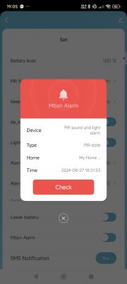 Motion Alarm Notification on Phone Screen Phone screen displaying a motion alarm notification with device details.