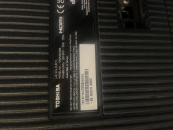 Toshiba 65UA6D63DB TV nameplate with model and power specifications