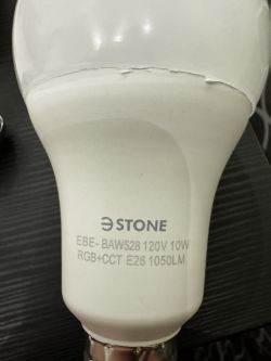 Close-up of 3Stone LED bulb showing technical specifications.