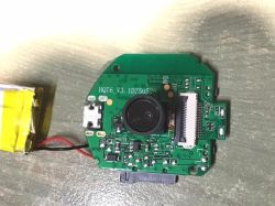 Camera PCB module labeled HQT6 V3 with lens and connectors visible