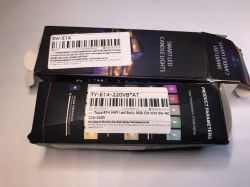 Two LED E14 bulb packages with labels.