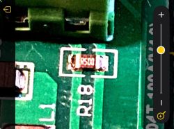 Damaged SMD resistor marked R500 on PZEM-004T circuit board