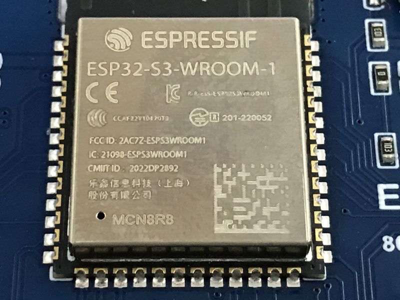 ESP32-S3-WROOM-1 Module on PCB ESP32-S3-WROOM-1 module with detailed markings on a PCB close-up.