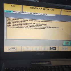 Diagnostic Error Codes on Laptop Display Laptop display showing diagnostic error messages for a car.
