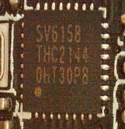 Close-up of a chip labeled SV6158.