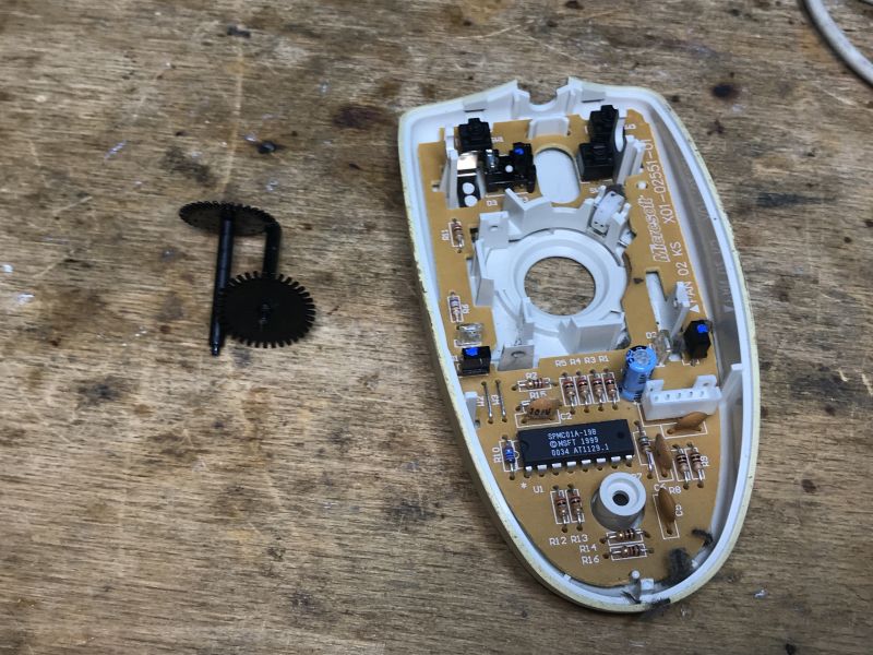 Inside of a Trekker Ball Mouse Inside of a disassembled ball mouse.