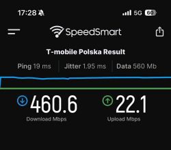 Zrzut ekranu testu prędkości internetu 5G T-Mobile pokazujący 460,6 Mbps pobierania i 22,1 Mbps wysyłania.