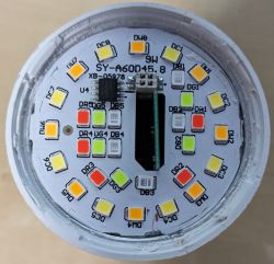 Circuit Board of Smart LED Bulb Close-up of the circuit board inside a smart bulb, with multi-colored LEDs and visible markings.