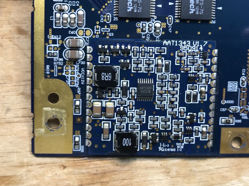 LG EAX31845201/13 Power Supply Board Power supply module from LG TV, model EAX31845201/13, showing capacitors, transformer, and a heatsink.