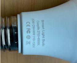 Smart Light Bulb with Specifications Smart light bulb with visible technical markings on the socket.