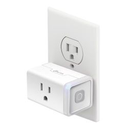 TP-Link Smart Plug in Outlet TP-Link smart plug connected to an American electrical outlet.