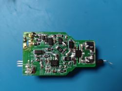 Close-up of a printed circuit board (PCB) with various electronic components.