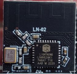 Close-up of a circuit board with a chip labeled LIGHTNING LN882HKI.