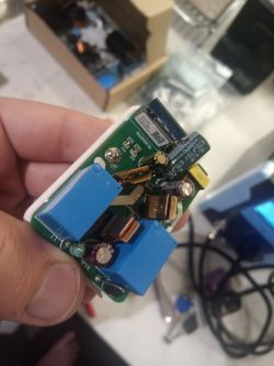 Close-up of an electronic circuit with a replaced 470uF 10V capacitor.