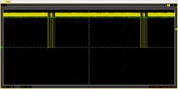 UART Signal Trace on Oscilloscope During WB2S Flashing Attempt Oscilloscope display with two traces, yellow and green, showing digital signal activity on a black grid background.