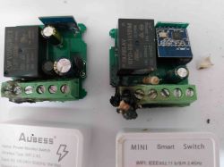 Damaged Smart Switches Two damaged smart switches on a white background.