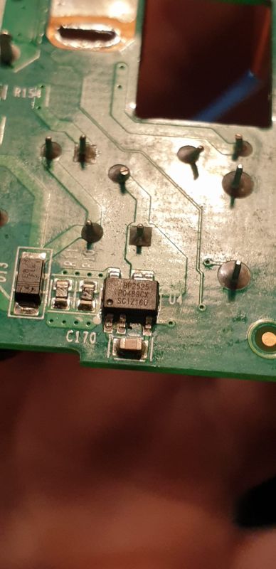 Close-up of a PCB showing a BP2525 IC, solder joints, and traces