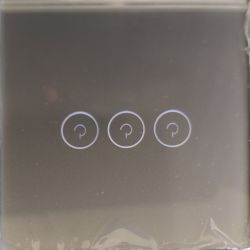 Glass panel with three illuminated touch buttons in circular shapes