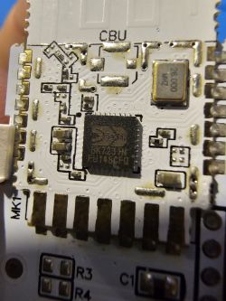 PCB with BK7231N Chip in Door Sensor Close-up of a PCB with a BK7231N chip and visible pin labels.