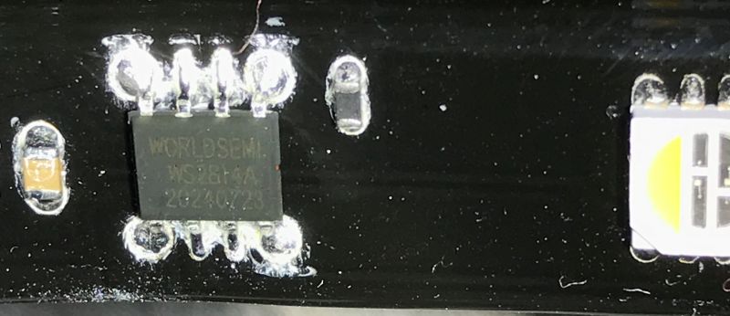 Close-up of WS2814A controller on RGBW LED strip
