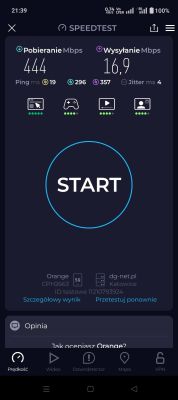 Zrzut ekranu z aplikacji Speedtest z wynikiem pobierania 444 Mb/s i wysyłania 16,9 Mb/s w sieci 5G Orange