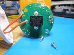 Interior of an E27 smart lamp holder showing electronic components.