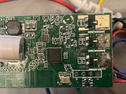 Damaged PCB with transistors and microcontroller Close-up of damaged PCB with burn marks and electronic components including transistors