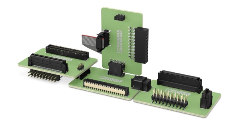 Zielone płytki PCB z czarnymi złączami płytka‑płytka i listwami pinów, logo Phoenix Contact