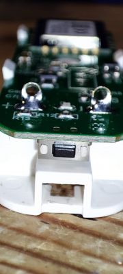 Close-up of an electronic device's PCB Close-up of a PCB with attached electronic components.