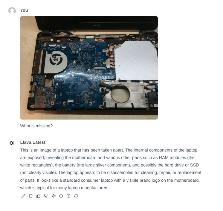 Interior of Disassembled Laptop Disassembled laptop interior missing disk and RAM.