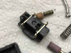 Disassembled Switch from a Celma Drill Disassembled switch from a Celma drill on a paper towel.