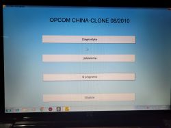 Main menu screen of OP-COM CHINA-CLONE 08/2010 program with options Diagnostic, Settings, About, Exit.