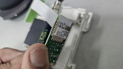 Close-up of an open device casing of EARU 63A EAWCPT-J with a visible 7231N chip.