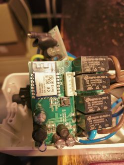 Inside View of Woox R6132 SMART WIFI Multi Power Socket Inside of the socket with circuit board and relays.